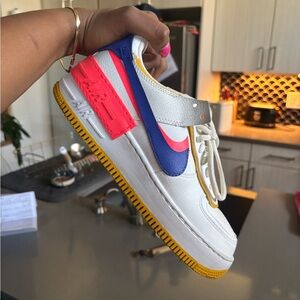 Nike White Sneakers with Blue and Pink Highlights